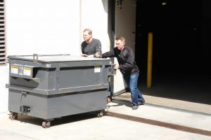 The Danger of Push and Pull Injuries - Think Dumpster Movers!