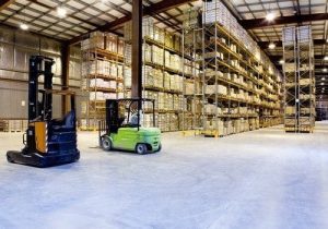 , Warehouse Workers Adapt to New Roles as Robots Move In