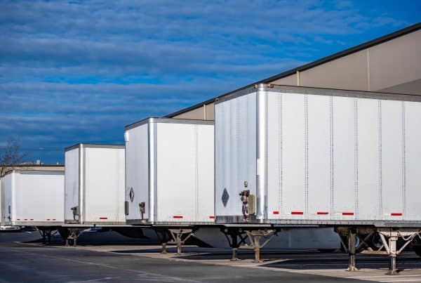 A Busy Trailer Yard in Need of a Motorized Trailer Dolly